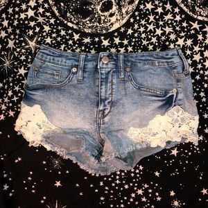 Jeans shorts with flowers on the bottom